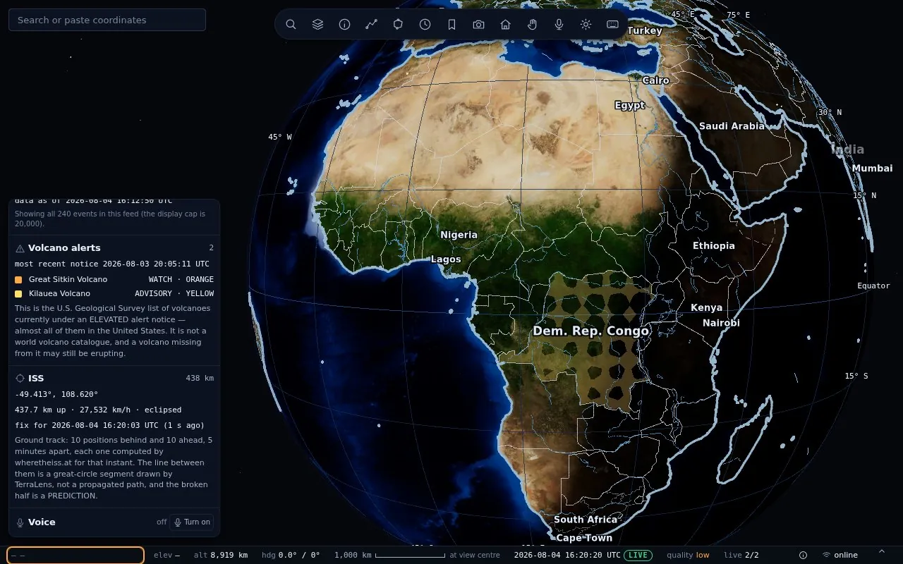 TerraLens inspector panel with volcano alerts and ISS track beside the globe